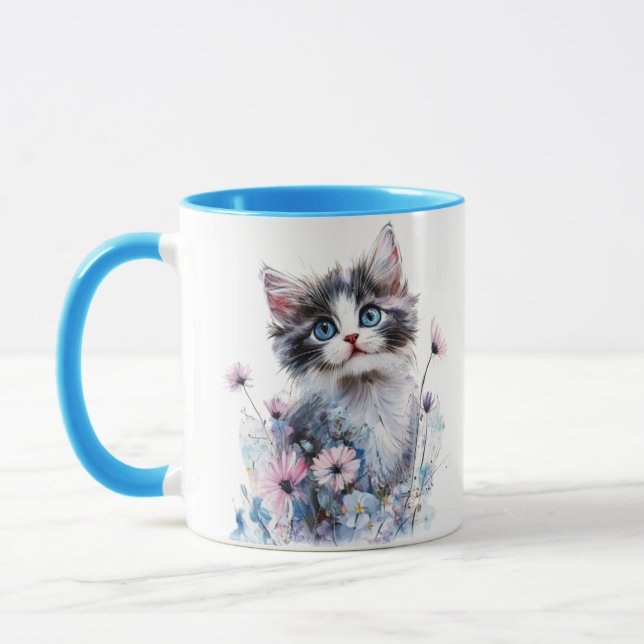 Sött litet kattunge i blommor målad mugg (Vänster)