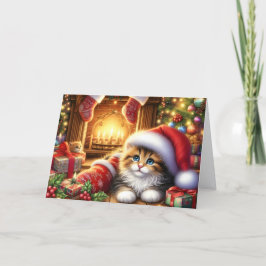 Sött litet kattunge vid öppen spis jul helgkort