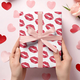 Sött mönster med valentinokyssar på presentpapper