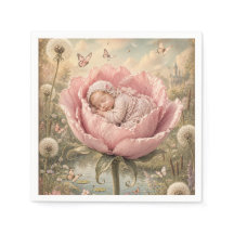 Sovande baby i rosa blomma