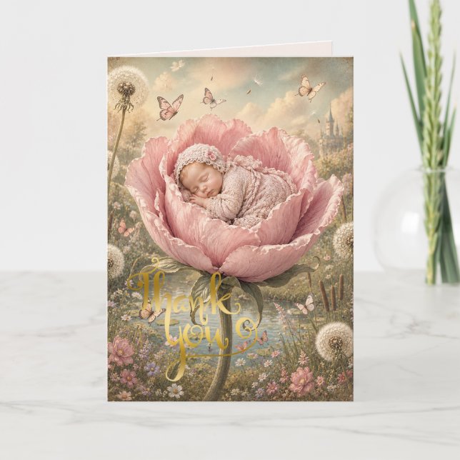 Sovande baby i rosa blomma  tack kort (Framsida)
