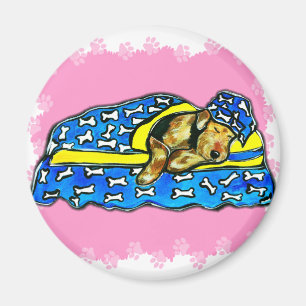 Sovande rosa airedale magnet