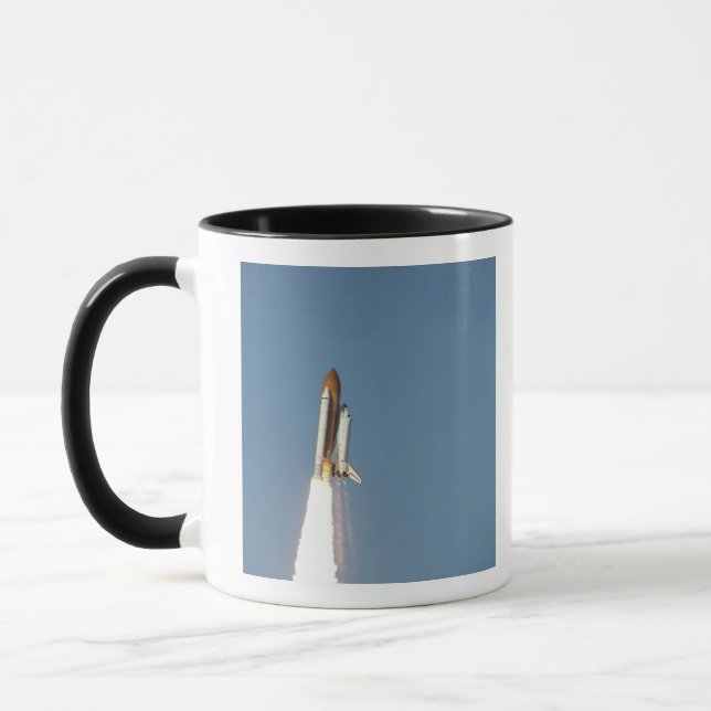 Space Shuttle Atlantis hiss av 11 Mugg (Vänster)