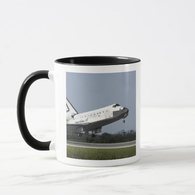 Space Shuttle Discovery-landar på Runway 33 2 Mugg (Vänster)