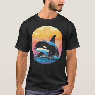 Späckhuggare som bryter ytan vid solnedgång vid ha t shirt