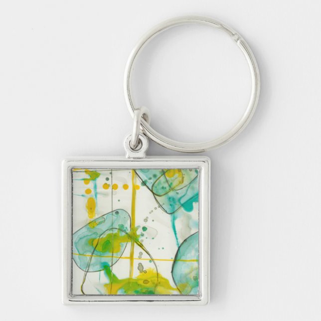 Spanska Stänk I Fyrkantig Silverfärgad Nyckelring (Framsidan)