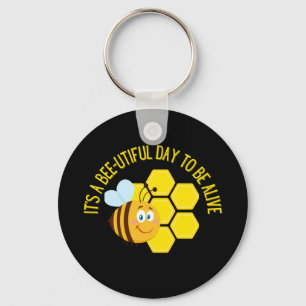 Spara Bees BEE Slogan citerar upplysningsgåvor Nyckelring