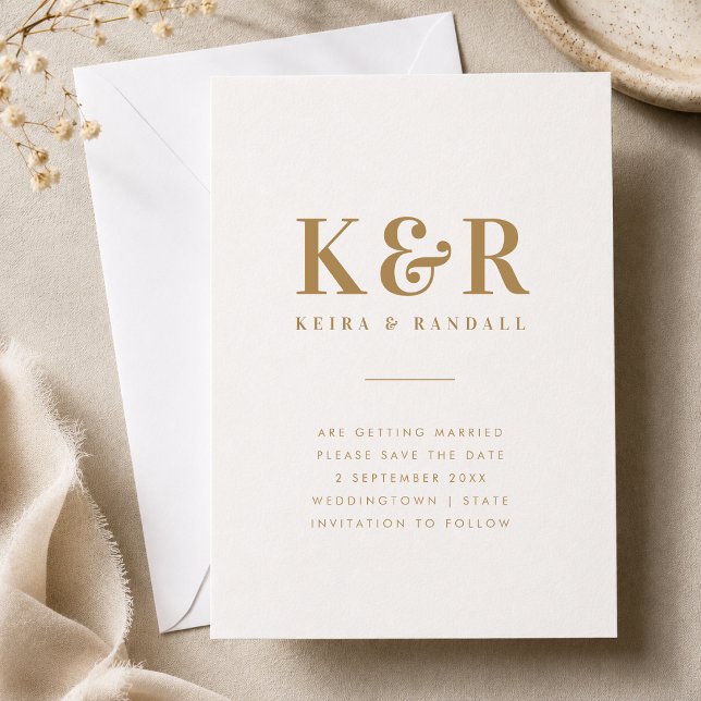 Spara datumet | Guldmonogram Bröllopsanmälan (Gold monogram save the date card with couple initials, names, date, and location details.)