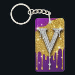Sparkling Letter V With Gold Glitter Drip<br><div class="desc">Sparkling diamond-encrusted letter V set against a gold glitter field with dripping metallic effect and vivid purple background,  evoking luxury,  glam monogram style,  celebration and high-fashion bling.</div>
