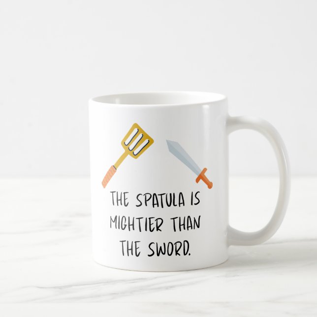 Spatula är mycket starkare än Sword Kaffemugg (Höger)