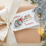 Speciell julutdelning från Nordpolen Presentetikett<br><div class="desc">Personlig Juletiketter för barn med redigerbar ordalydelse och christmas gnomes illustration.Den här söta vattenfärgsdesignen har två gnomer med enorm roligt på sin sled genom att dra ett glapp fylld med presenter. Den har vismisk typografi och är skriven med "Speciell Delivery from the North Pole, TO: [children namn(s)], FROM: Santa". Du...</div>