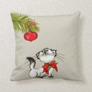 Spelande Kattunge i en röd julklapp Kudde