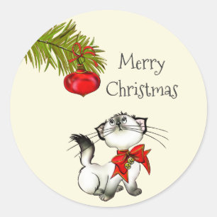 Spelande Kattunge i en röd julklapp Runt Klistermärke