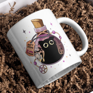 Spelande ondskefullt kattmonster som fångats i Pot Kaffemugg