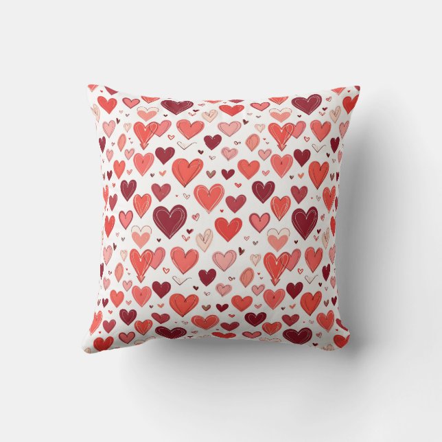 Spelande röda hand plockade-hjärtan mönster på vit kudde (Baksida)