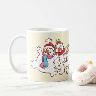 Spelande snögubbar kaffemugg
