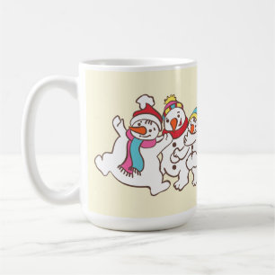 Spelande snögubbar kaffemugg