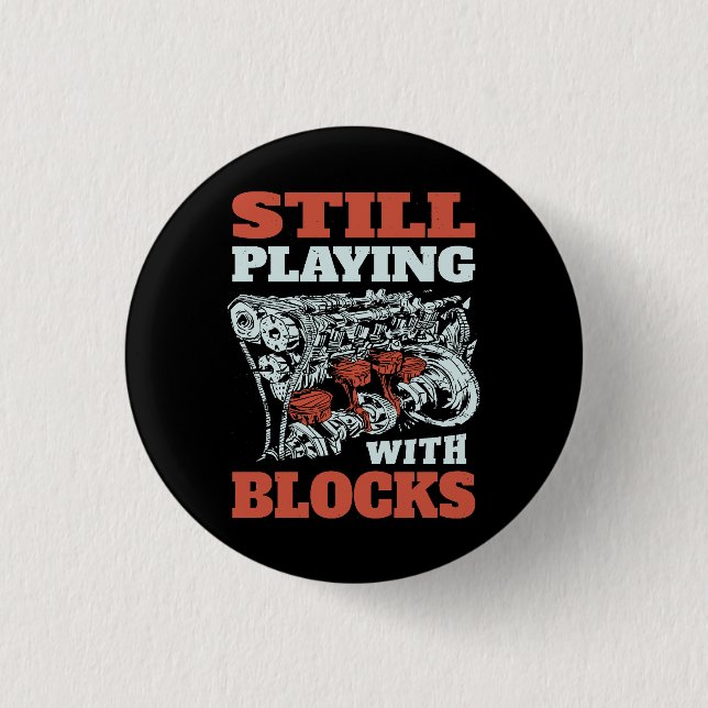 Spelar fortfarande med block Mekanik Knapp (Framsida)