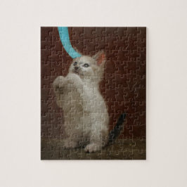 Spelar Kittie Pussel