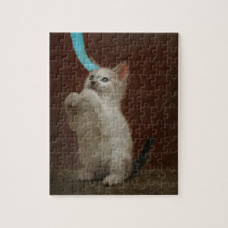 Spelar Kittie Pussel