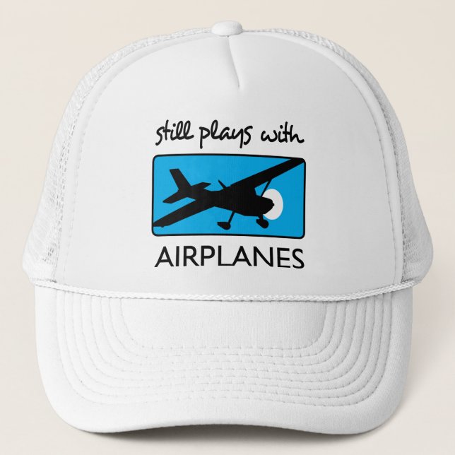 Spelas fortfarande med flygplan keps (Framsida)