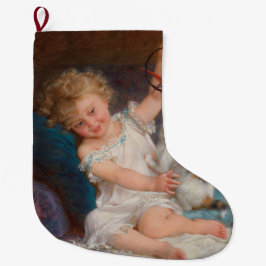 Speltid: Flickan spelar med sin Pet Kitten Stor Julstrumpa