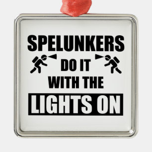 Spelunkers gör det med Ljus på Julgransprydnad Metall