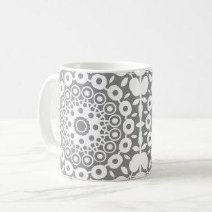 Spetsiga vita fyrkanter på en ljusgrå bakgrund kaffemugg