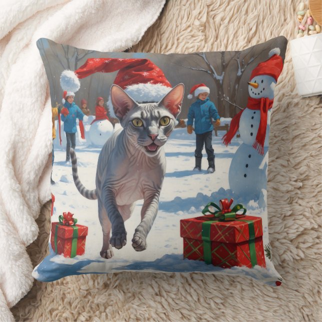 Sphynx-katt springer i snö med julhatt kudde (Filt)
