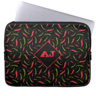 Spicy Red and Grönt Chili Peppers on Black Laptop Fodral