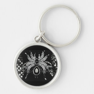 Spindel rhinestone diamant look och svart tarantel rund silverfärgad nyckelring