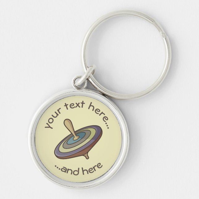 Spinning överst rund silverfärgad nyckelring (Framsidan)