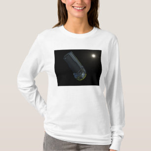 Spitzer som ses i synligt ljust t-shirt