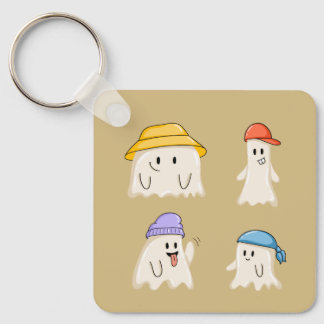 Spökvänner som bär färgglada hattar nyckelring
