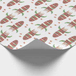 Spränga raket som slår in papper presentpapper