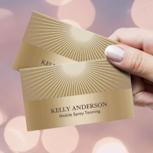 Sprej som garvar den guld- solen för salongen, visitkort