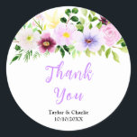Spring Purple Floral Wedding Thank You Runt Klistermärke<br><div class="desc">This beautiful and elegant wedding thank you sticker features watercolor purple flowers and foliage. The text combines handwritten script and serif fonts for a stylish and modern look. This is perfect for a spring rustic wedding.</div>
