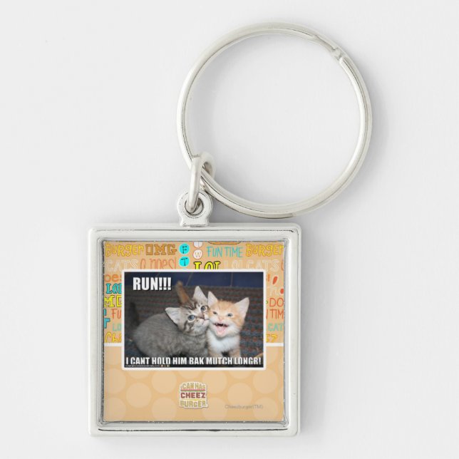 SPRINGA!!! FYRKANTIG SILVERFÄRGAD NYCKELRING (Framsidan)