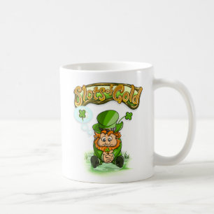 Springor av den guld- fyrklövra muggen kaffemugg