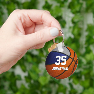 Spritpresenter för blått grått-basketlag nyckelring