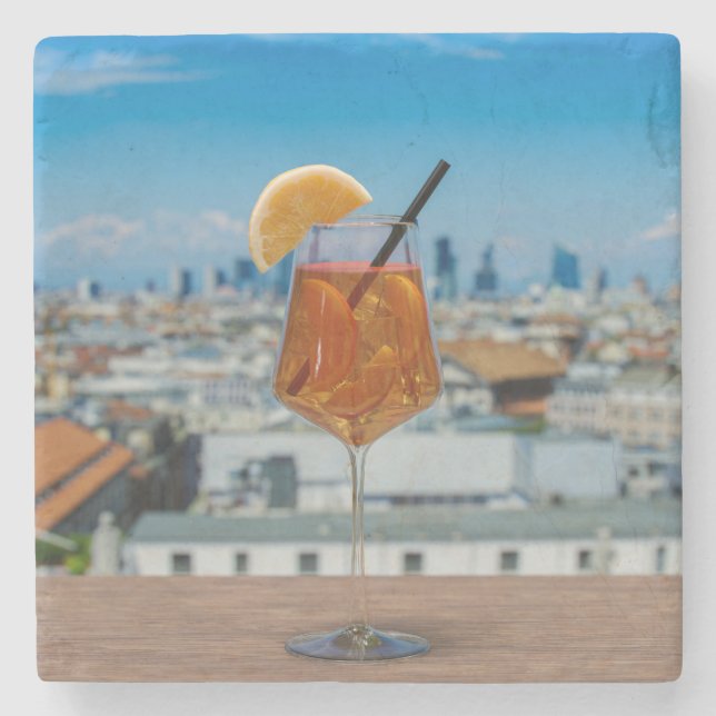 Spritz-cocktail på bord mot Milano Stenunderlägg (Framsidan)
