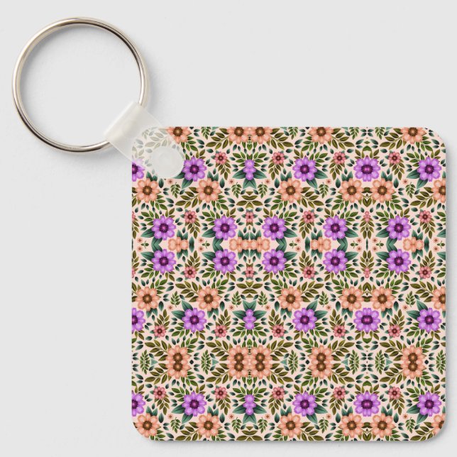 Square keychain showcasing a vibrant floral  nyckelring (Framsida)