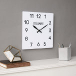 Square wall clock with modern dial design fyrkantig klocka<br><div class="desc">Square wall clock with modern dial design. Personalize with custom name or text. Black and white minimalistic design. Upload your own photo optionally. Great time keeper for home,  office,  hall,  club and more.</div>