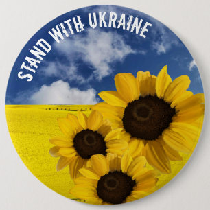 Stå med Ukrainas gult och blå med solblommor Knapp