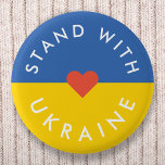 Stå upp mot Ukrainas protester mot Krig, Ukrainas  Knapp<br><div class="desc">"Stå med Ukraina" för att visa solidaritet och stödja protesterna mot krig mot krig i Ukraina. Utformningen har ett rent rött hjärta över en ukrainsk Flagga i färg av blått och gult. Jag kommer att donera 100 procent av min kommission som tjänade på detta produktsortiment för att stödja insatserna i...</div>