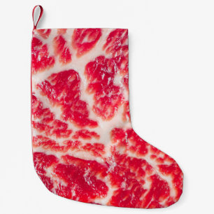 Stäcken av färskt obearbetat nötkött som har marmo liten julstrumpa