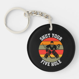 Stäng din fem Hål Hockey Goalie