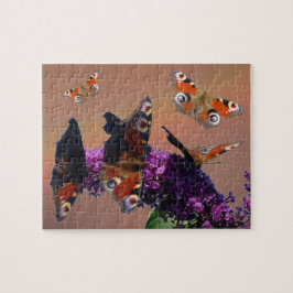 Stäng Puzzle: Peacock Butterflies Pussel