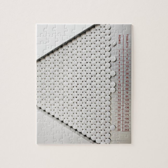 Stäng tabletterna i sorteringsbrickan pussel (Vertikal)