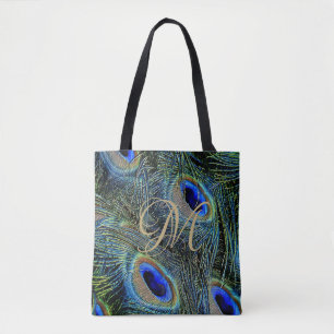 Stäng upp färgade Peacock Feathers Guld Monogram Tygkasse